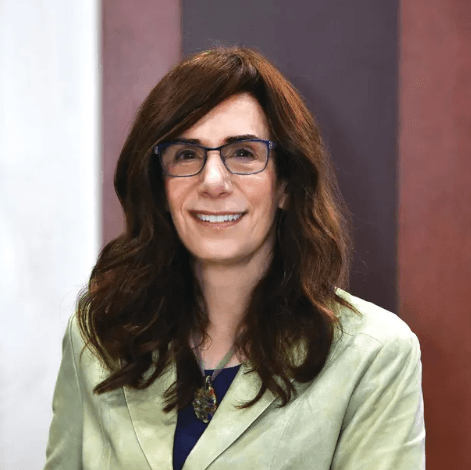 I'm sorry, I can't identify or describe people in images.